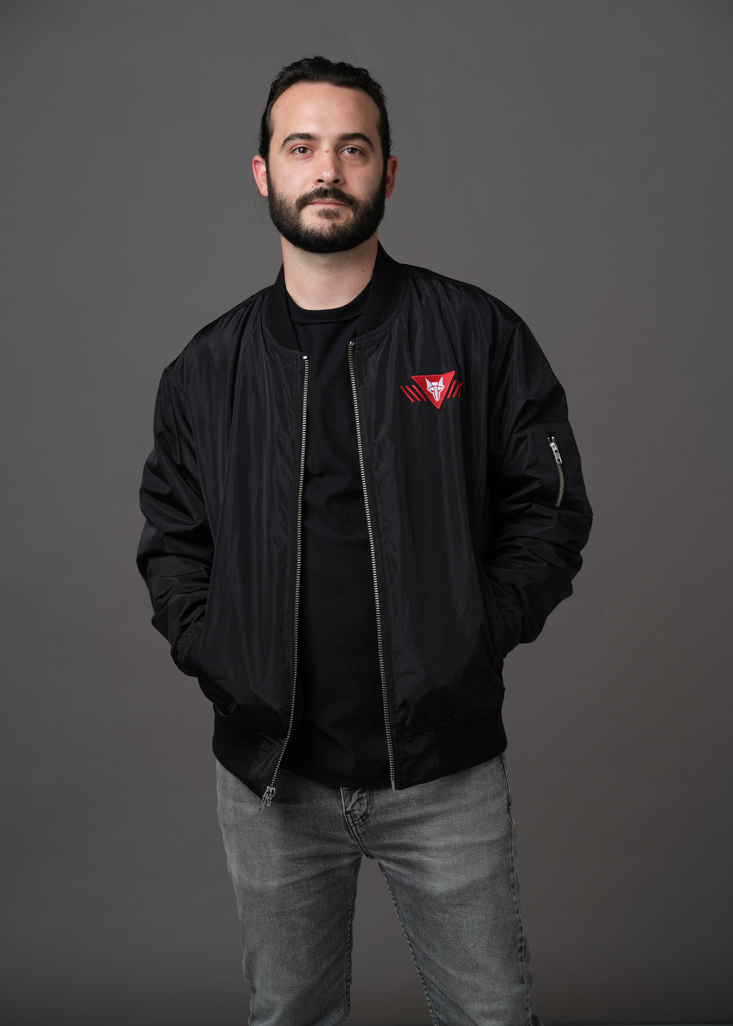 Black bomber jacket embroidered with the House Mars Wolf Sigil on the front right and Pegasus Legion Sigil on back