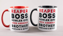 Load image into Gallery viewer, Two mugs, one with black interior and handle, one with red interior and handle. Both have text in red and black that says &#39;Reaper, Boss, Howler One, Apex Asshole, Brother, Mustang&#39;s Bitch&#39;
