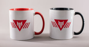 Two mugs, one with black interior and handle, one with red interior and handle. Both have red wolf howler sigil