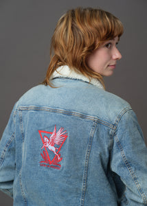Blue denim and white sherpa jacket embroidered with the House Mars Sigil on the front right and Pegasus Legion Sigil on back