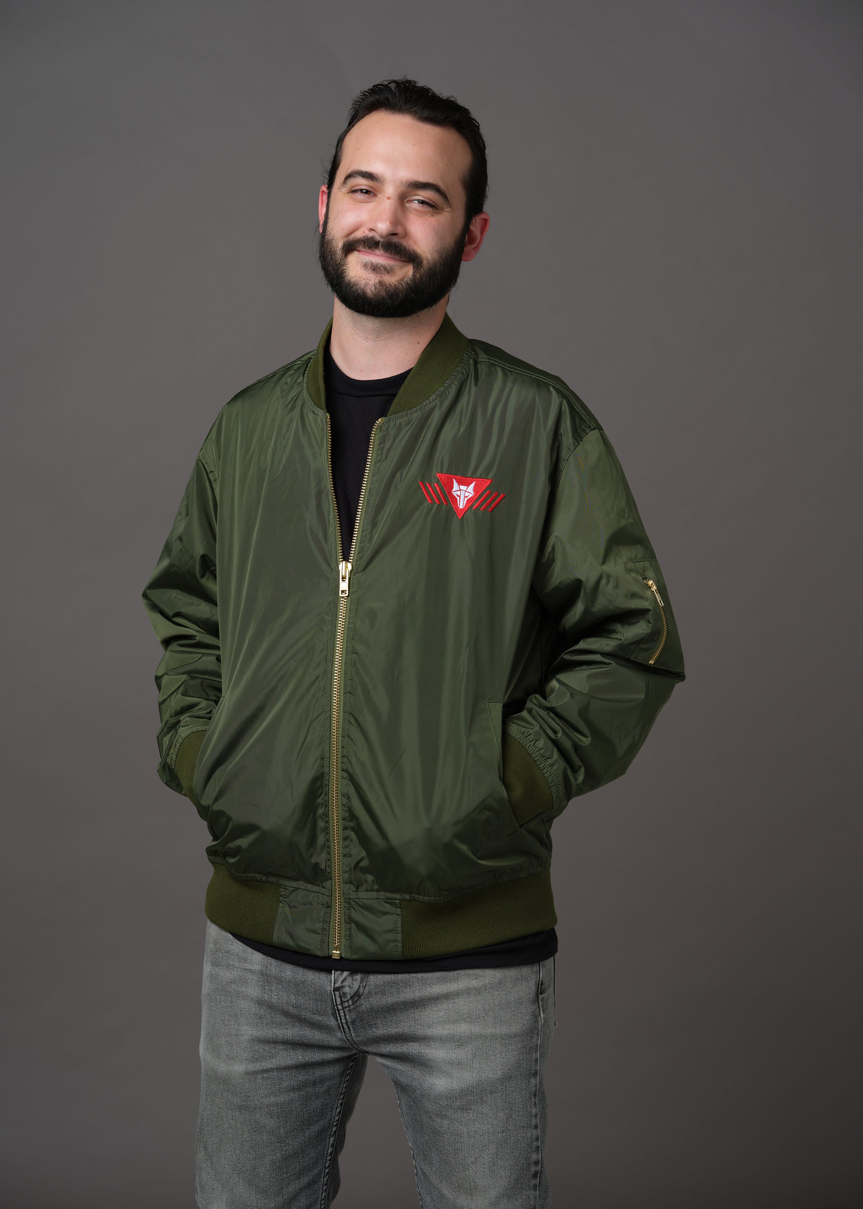 Army green bomber jacket embroidered with the House Mars Wolf Sigil on the front right and Pegasus Legion Sigil on back