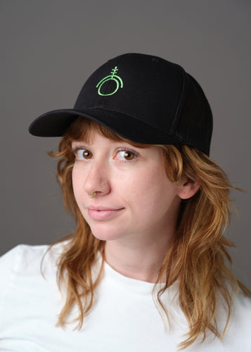 Black hat with the green sigil of technicians and programmers