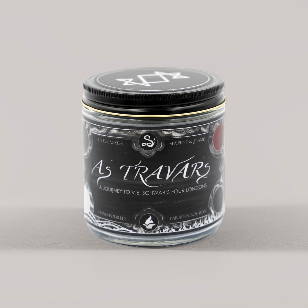 Round candle with label that says 'As Travars, a journey to V.E.Schwab's four Londons'