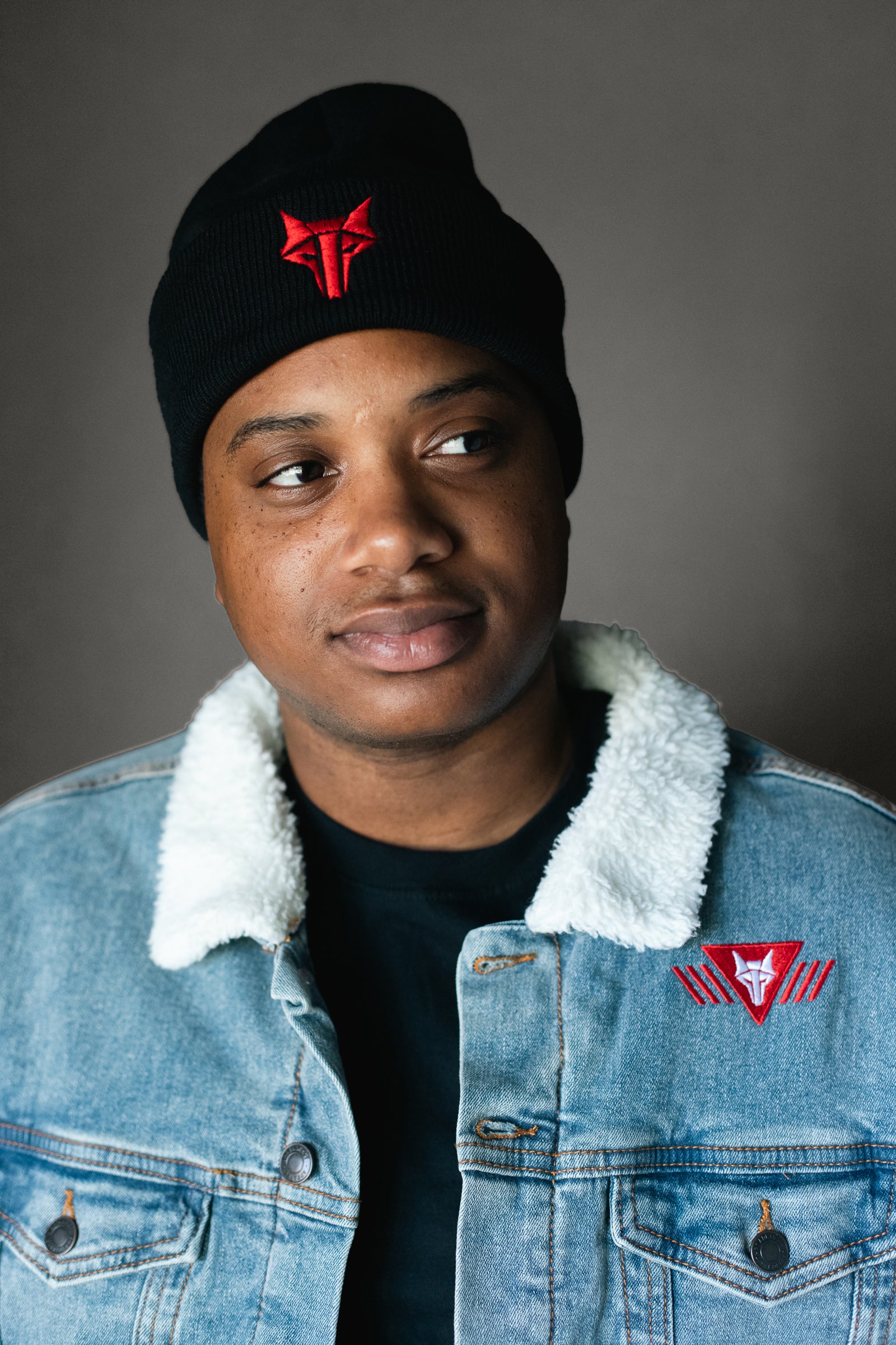 Black beanie hat with red embroidered Howler sigil 