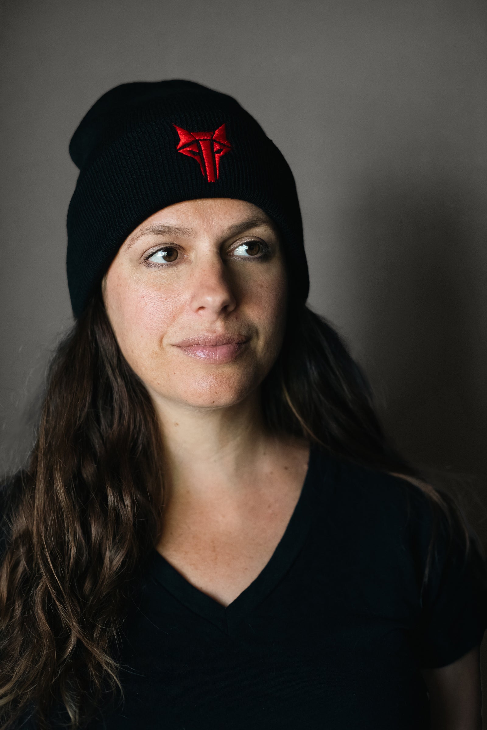 Black beanie hat with red embroidered Howler sigil 