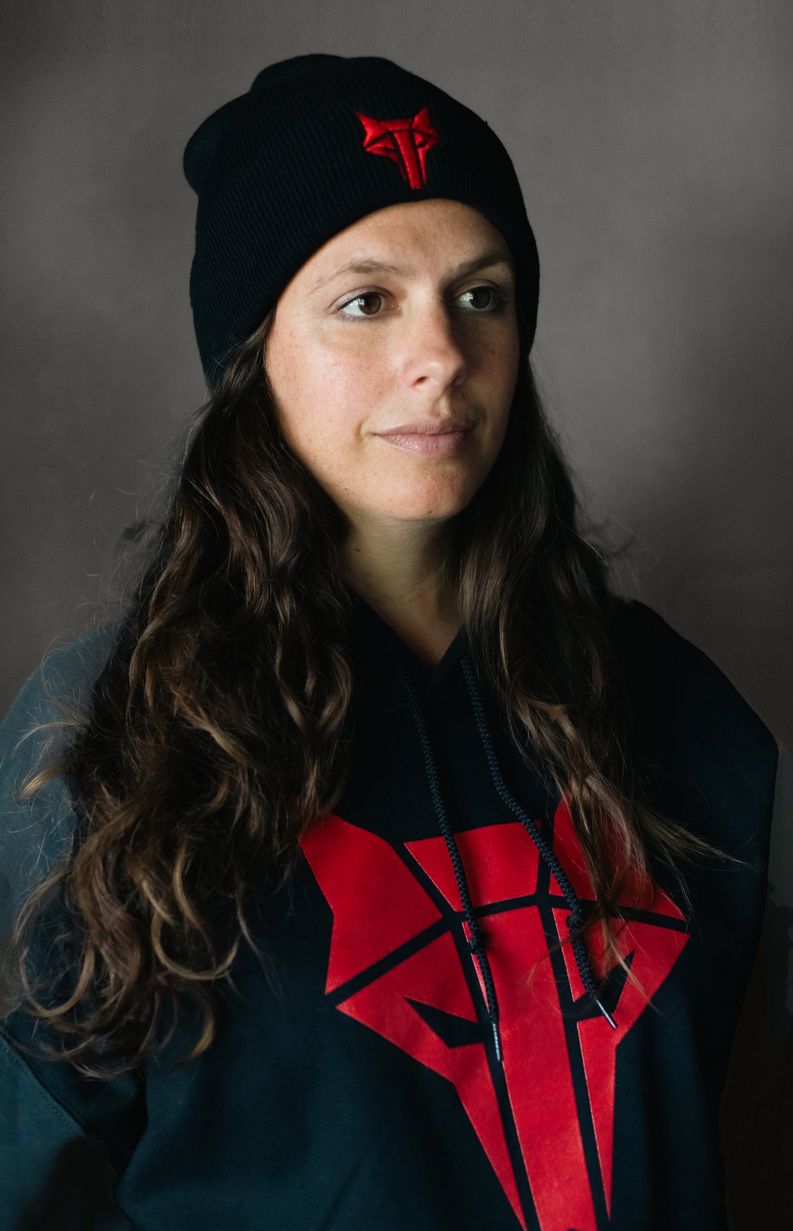 Black beanie hat with red embroidered Howler sigil 