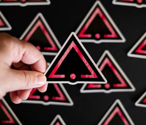 Sticker with the pink sigil of pleasure slaves and social functionaries