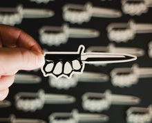 Load image into Gallery viewer, Sticker of a knife with brass knuckles on the handle
