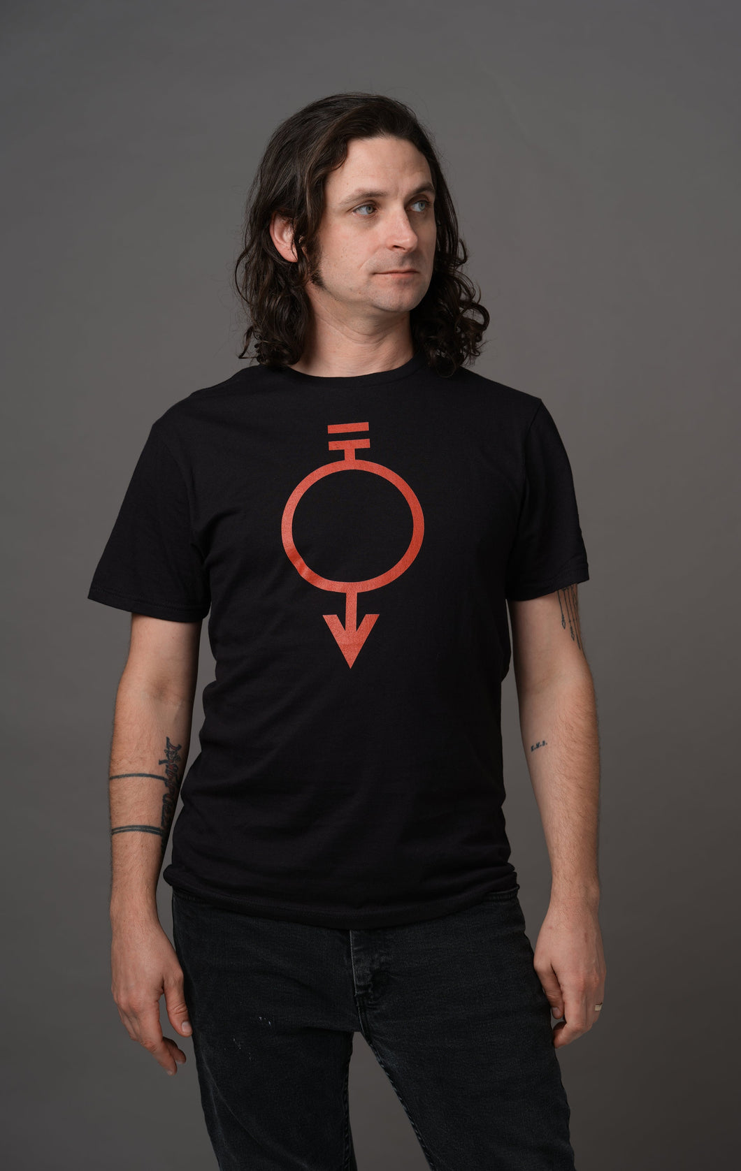 Black shirt printed with the red sigil for manual laborers and miners