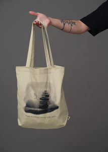 Natural canvas tote with a pirate ship on the ocean under a full moon and text that reads 'Stop fucking with the ship'