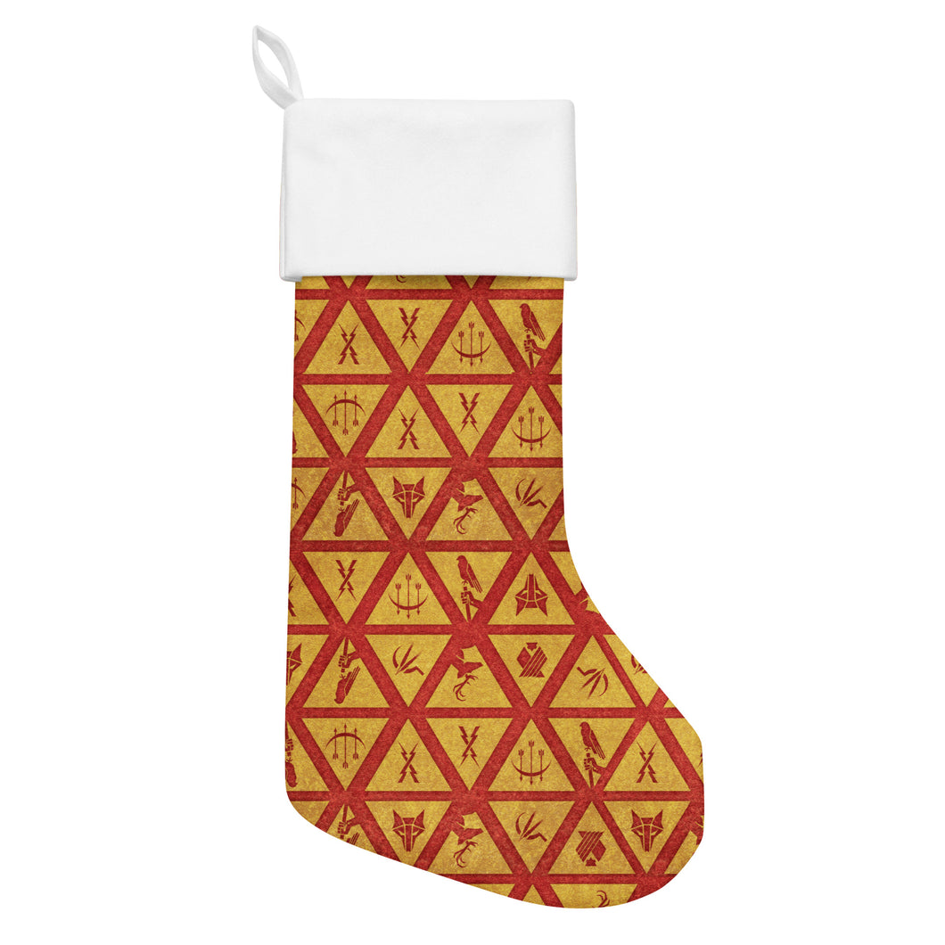 Christmas stocking with a white cuff and red house sigils on a gold background