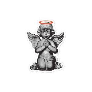 Sticker of a smirking praying angel statue with an orange halo
