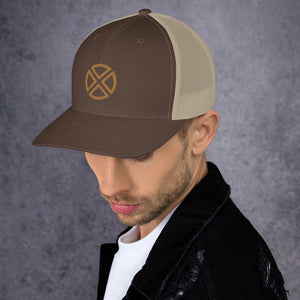 Brown hat with four brown triangles pointing inward with round edges making a circle