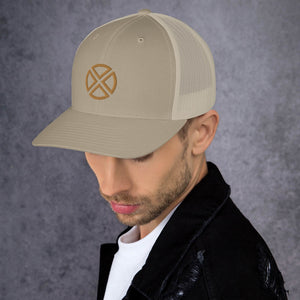 Khaki hat with four brown triangles pointing inward with round edges making a circle