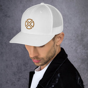 White hat with four brown triangles pointing inward with round edges making a circle