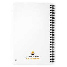 Load image into Gallery viewer, Back cover of spiral notebook that says V.E. Schwab and Lit Escalates with a flaming book logo
