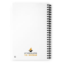 Load image into Gallery viewer, Back cover of spiral notebook that says V.E. Schwab and Lit Escalates with a flaming book logo
