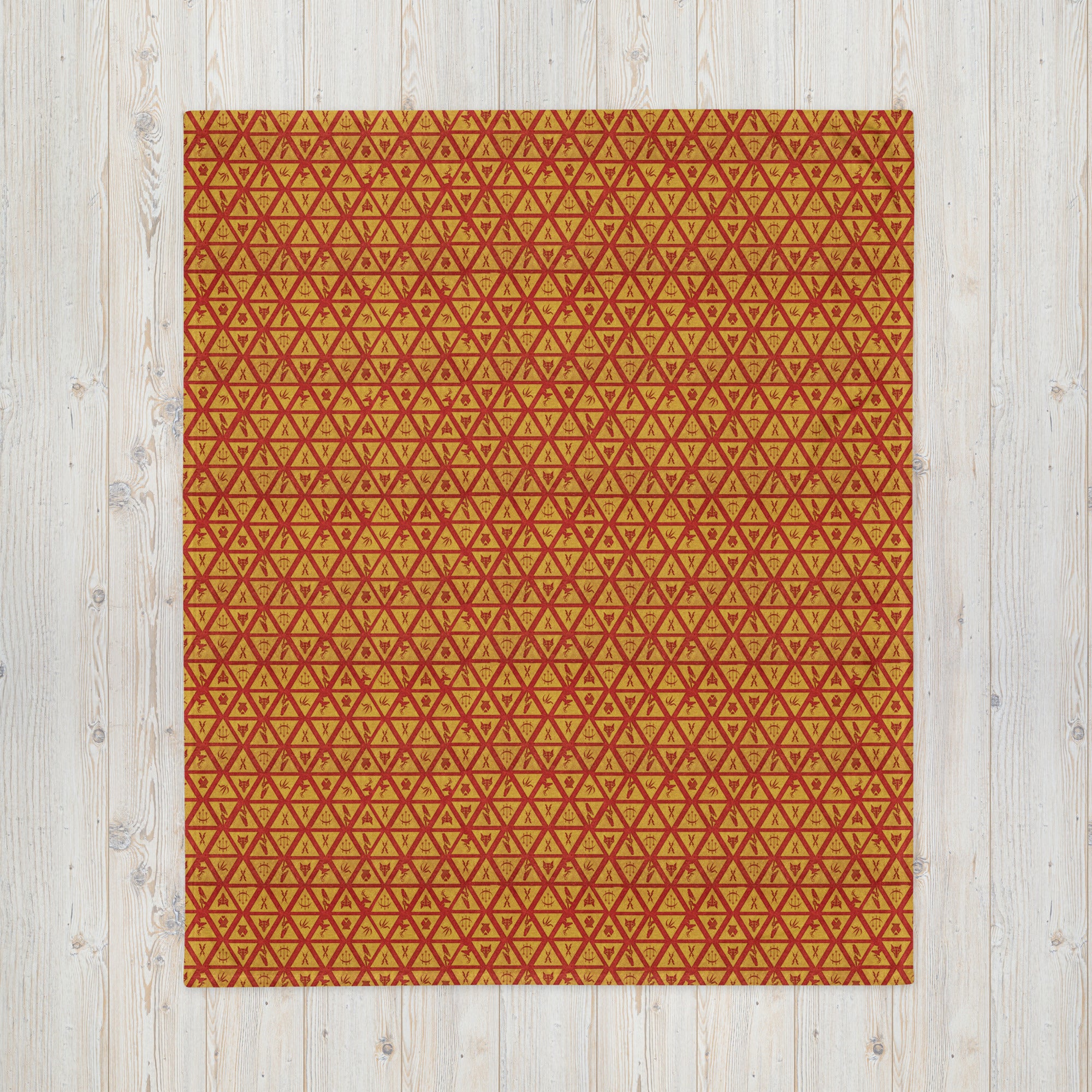 Cozy blanket printed with the red and gold House Sigils from Red Rising