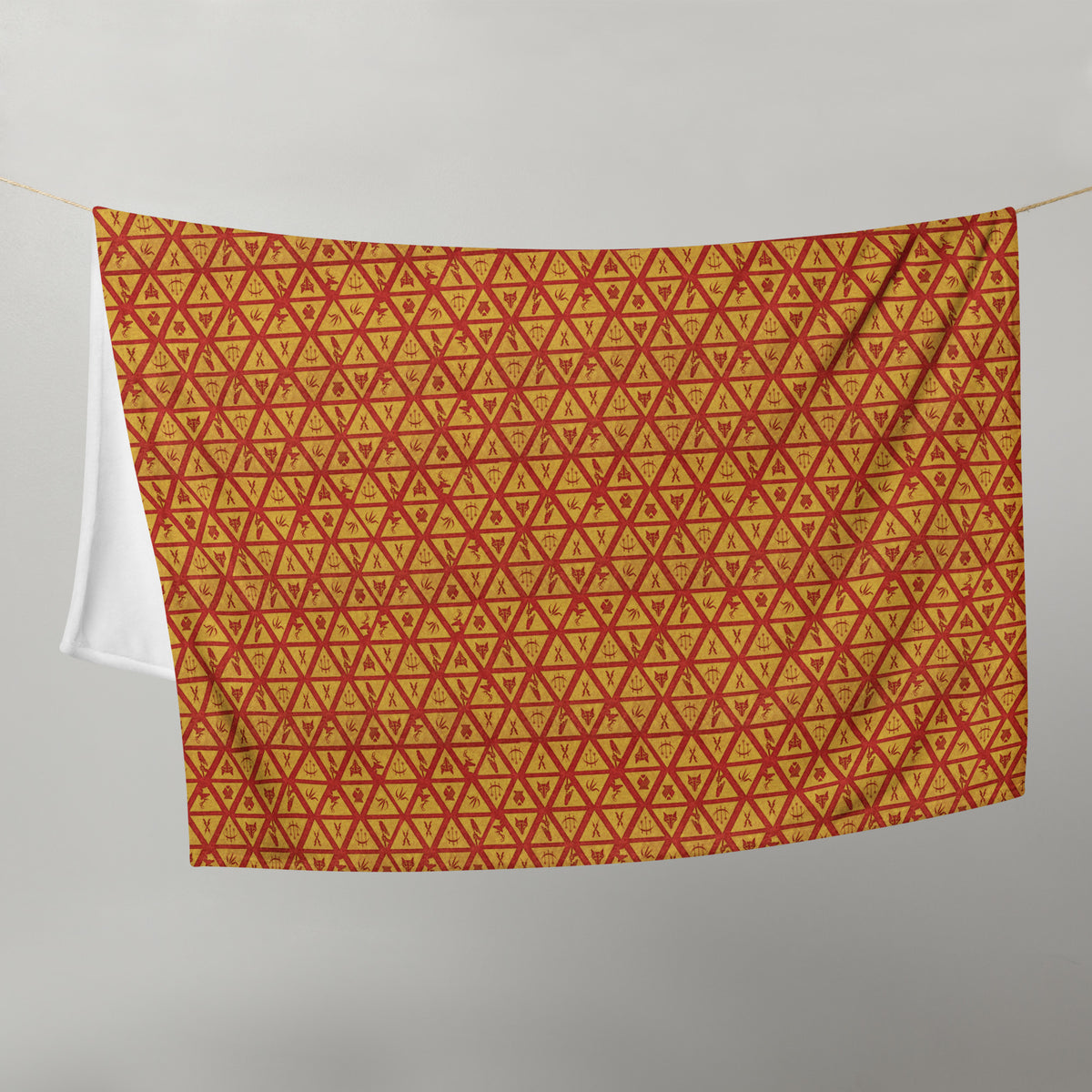 Cozy blanket printed with the red and gold House Sigils from Red Rising