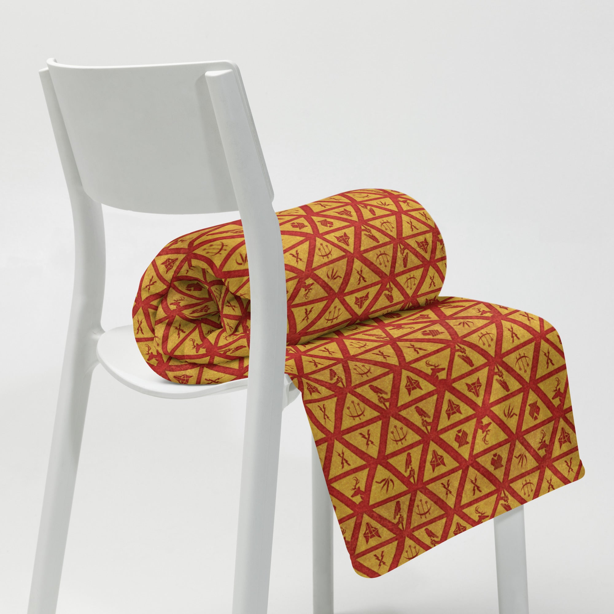 Cozy blanket printed with the red and gold House Sigils from Red Rising