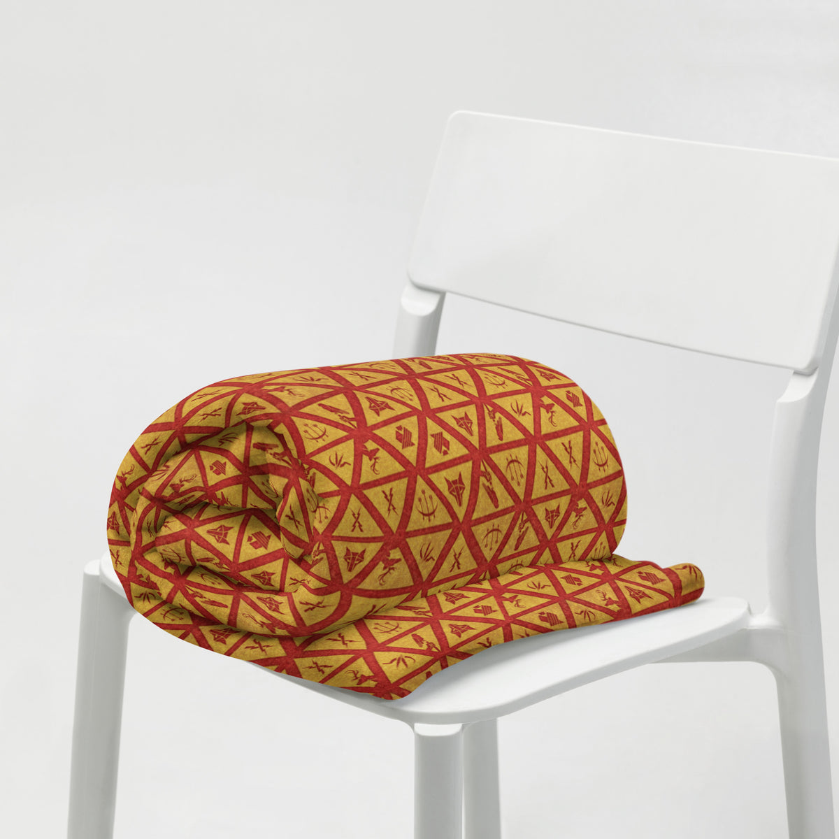 Cozy blanket printed with the red and gold House Sigils from Red Rising