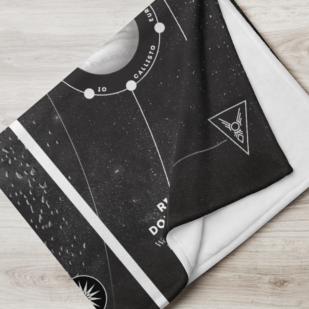Cozy black and white blanket printed with the official Solar System map designed for Iron Gold